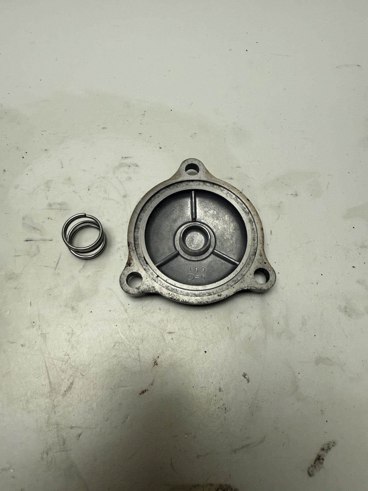 2000-2023 SUZUKI QUADSPORT LTZ 400 OEM OIL FILTER COVER w/ SPRING