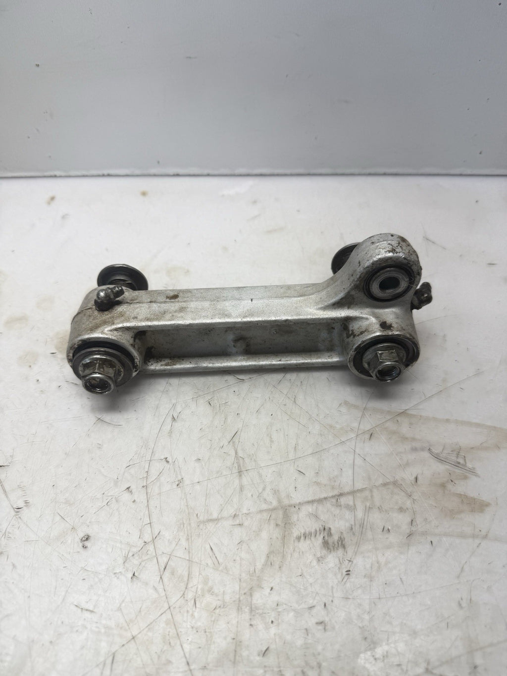 2003-2009 Suzuki LTZ 400 OEM Rear Dogbone Shock Linkage Link