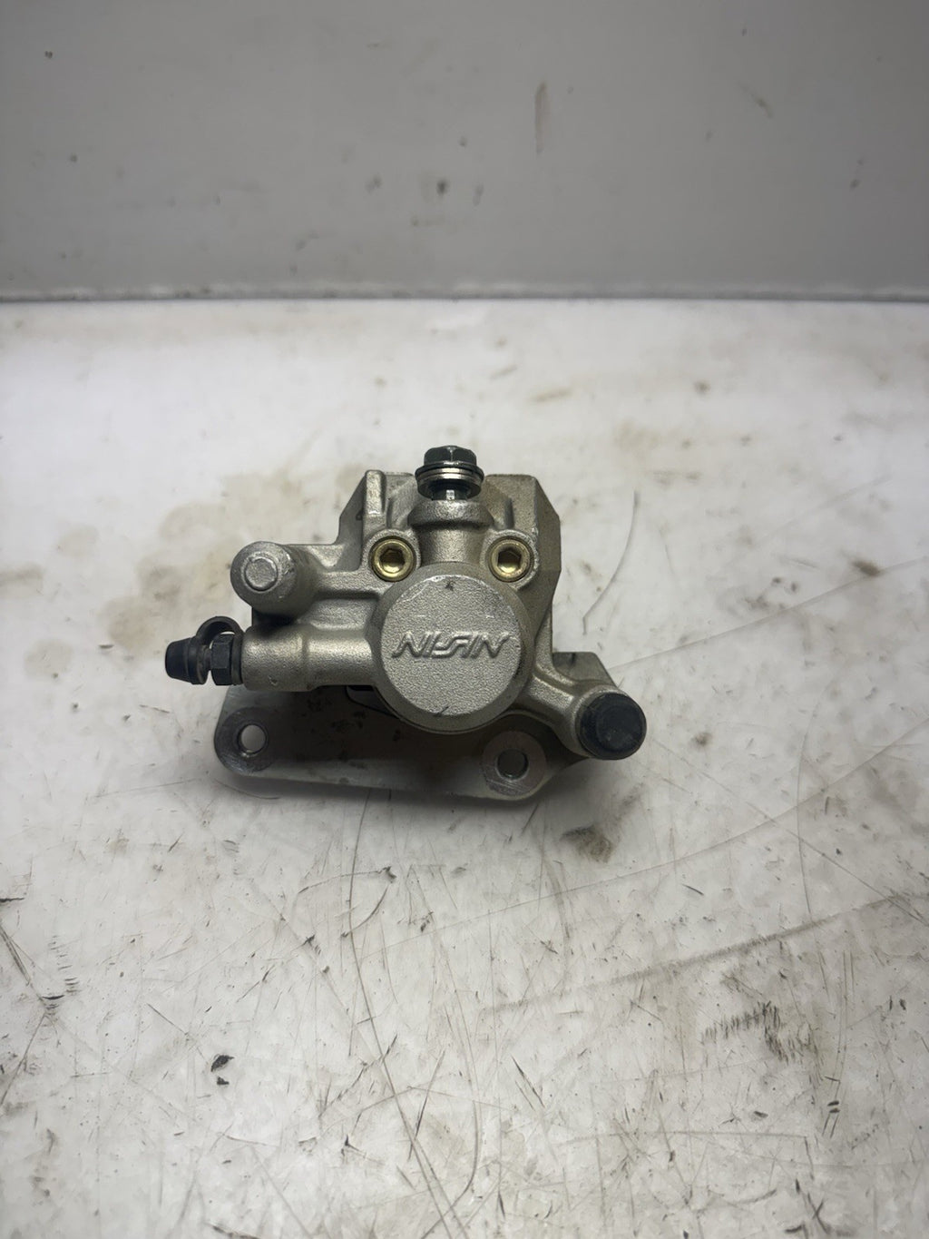 2004-2005 KAWASAKI KX65 OEM NISSIN FRONT  HYDRAULIC BRAKE CALIPER ASS’Y