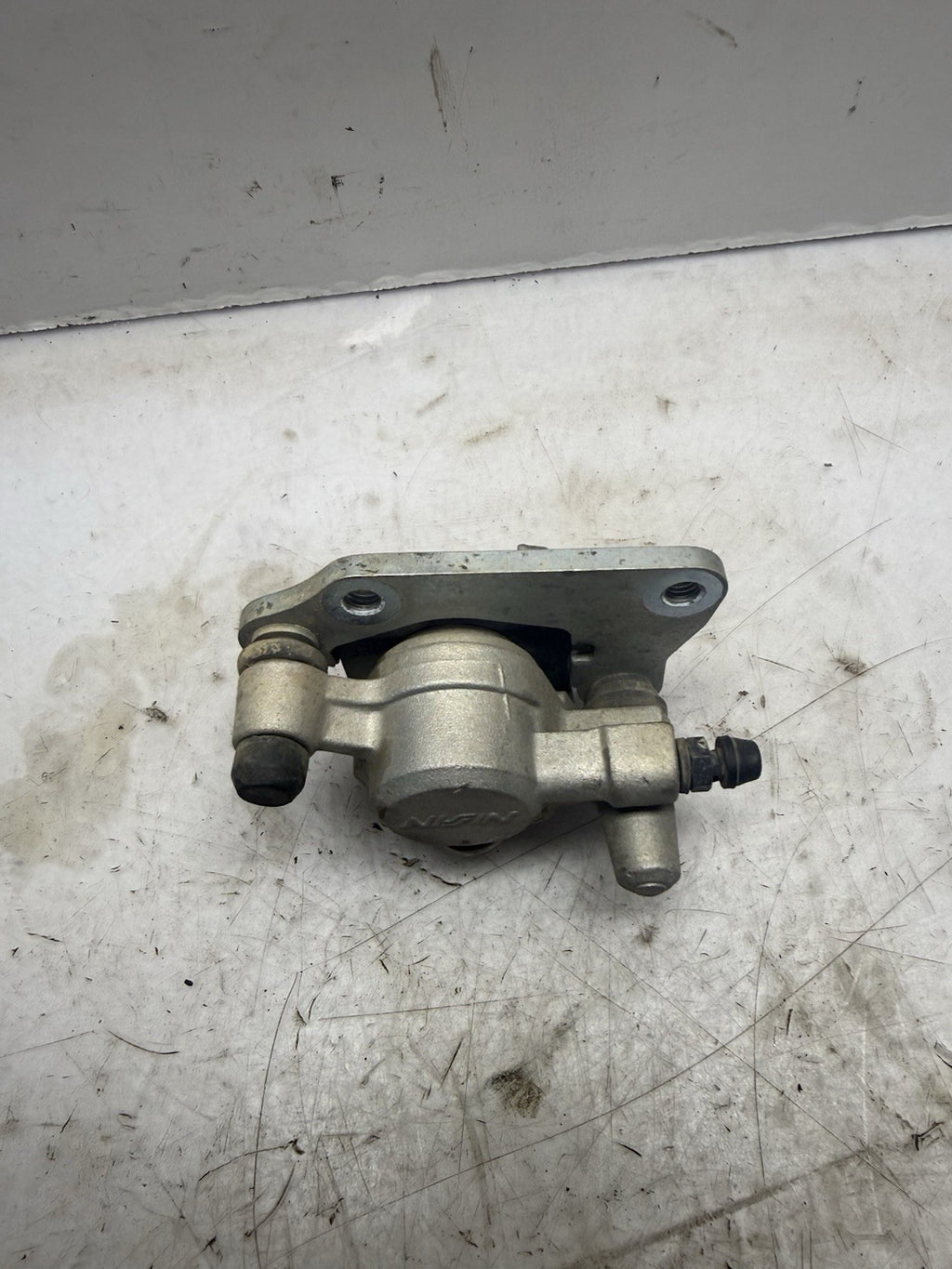 2004-2005 KAWASAKI KX65 OEM NISSIN FRONT  HYDRAULIC BRAKE CALIPER ASS’Y