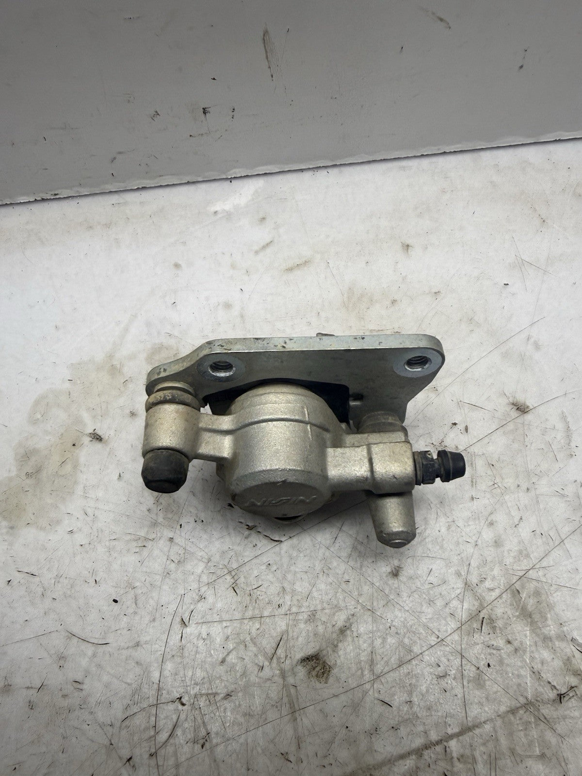 2004-2005 KAWASAKI KX65 OEM NISSIN FRONT  HYDRAULIC BRAKE CALIPER ASS’Y