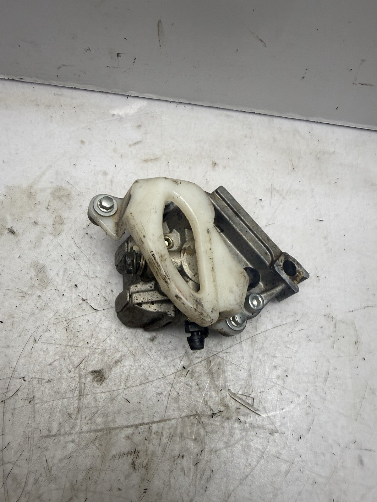 2004-2027 KAWASAKI KX65 OEM REAR HYDRAULIC BRAKE CALIPER ASS’Y