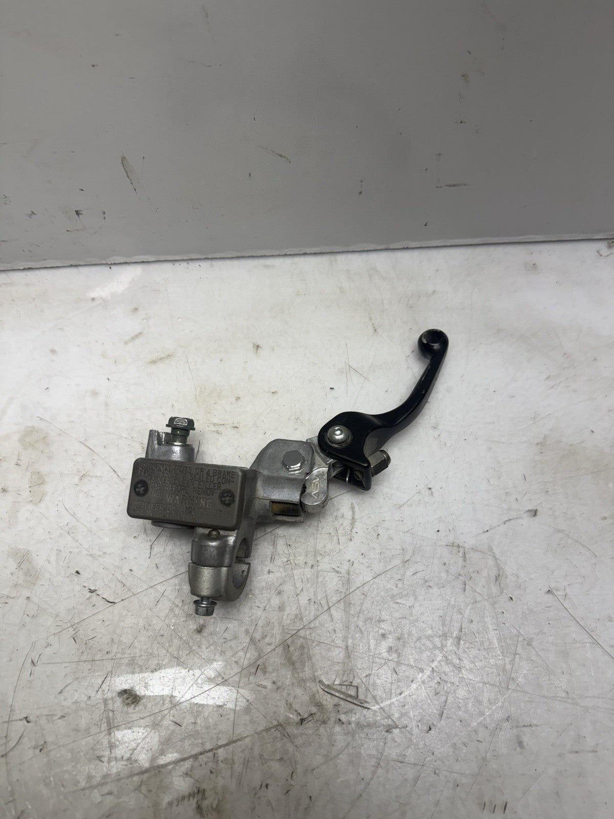 2001-2009 KAWASAKI KX65 OEM NISSIN FRONT BRAKE MASTER CYLINDER W/ ASV LEVER