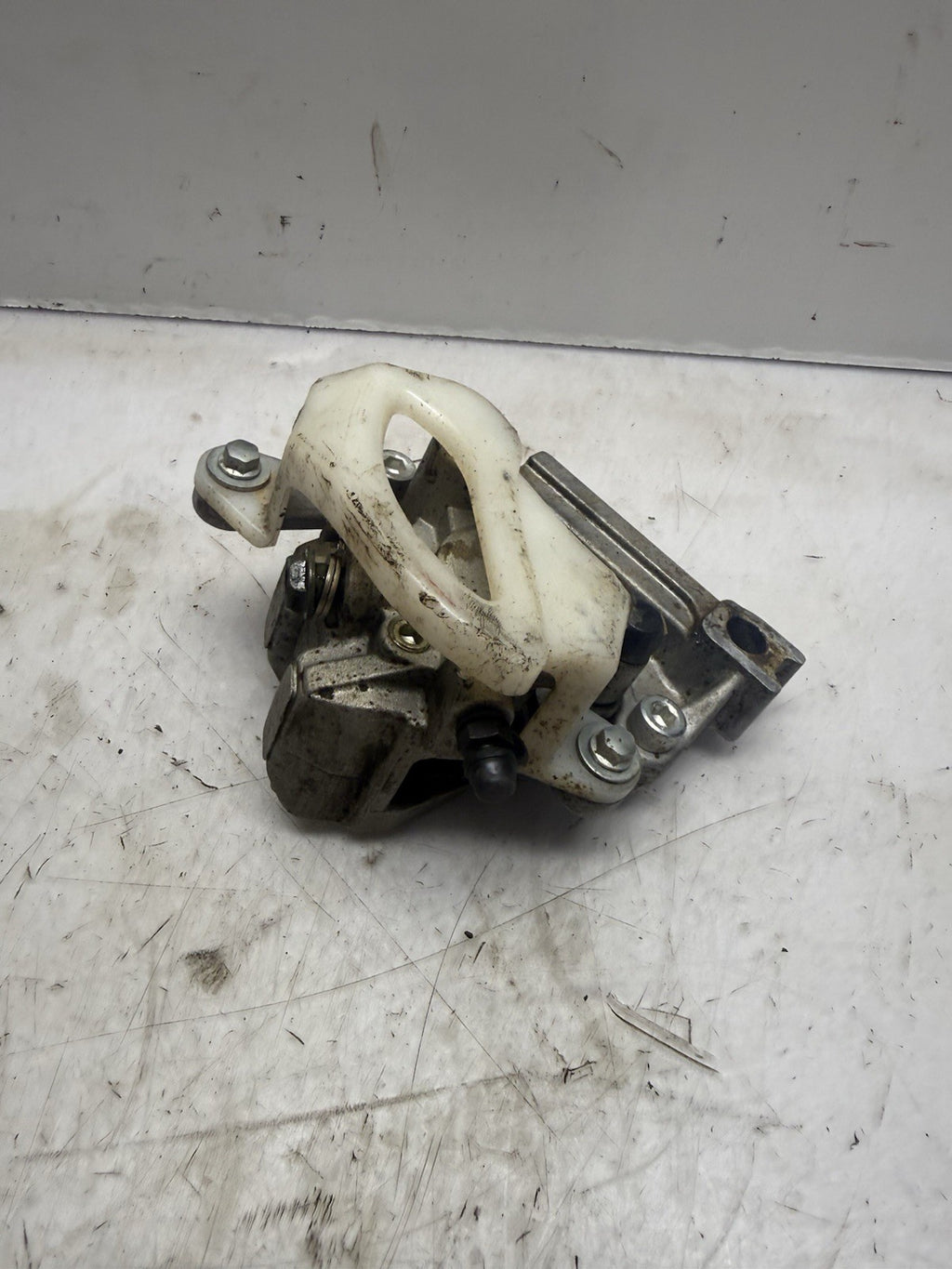 2004-2027 KAWASAKI KX65 OEM REAR HYDRAULIC BRAKE CALIPER ASS’Y