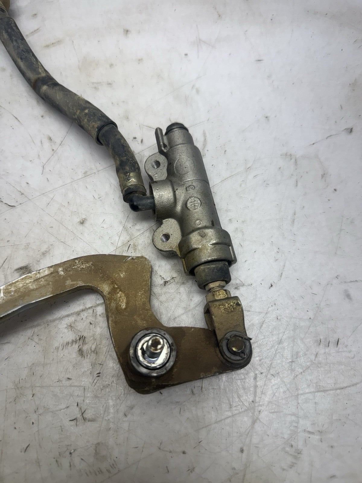 2002-2027 Kawasaki KX65 OEM REAR BRAKE MASTER CYLINDER GENUINE NISSIN w/ PEDAL