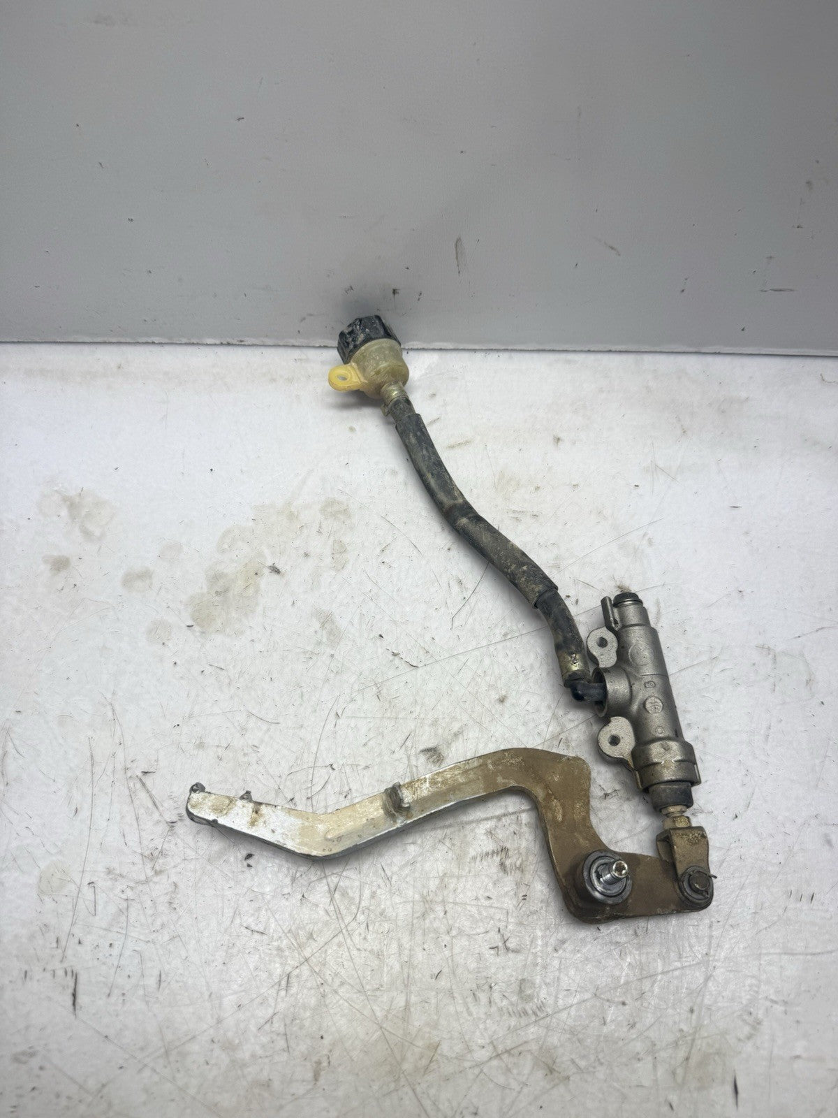 2002-2027 Kawasaki KX65 OEM REAR BRAKE MASTER CYLINDER GENUINE NISSIN w/ PEDAL