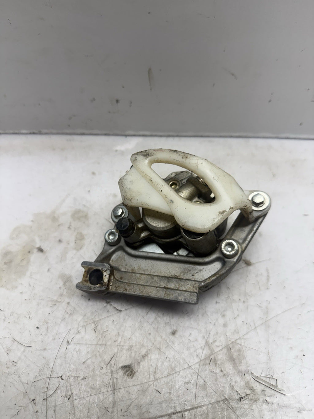 2004-2027 KAWASAKI KX65 OEM REAR HYDRAULIC BRAKE CALIPER ASS’Y