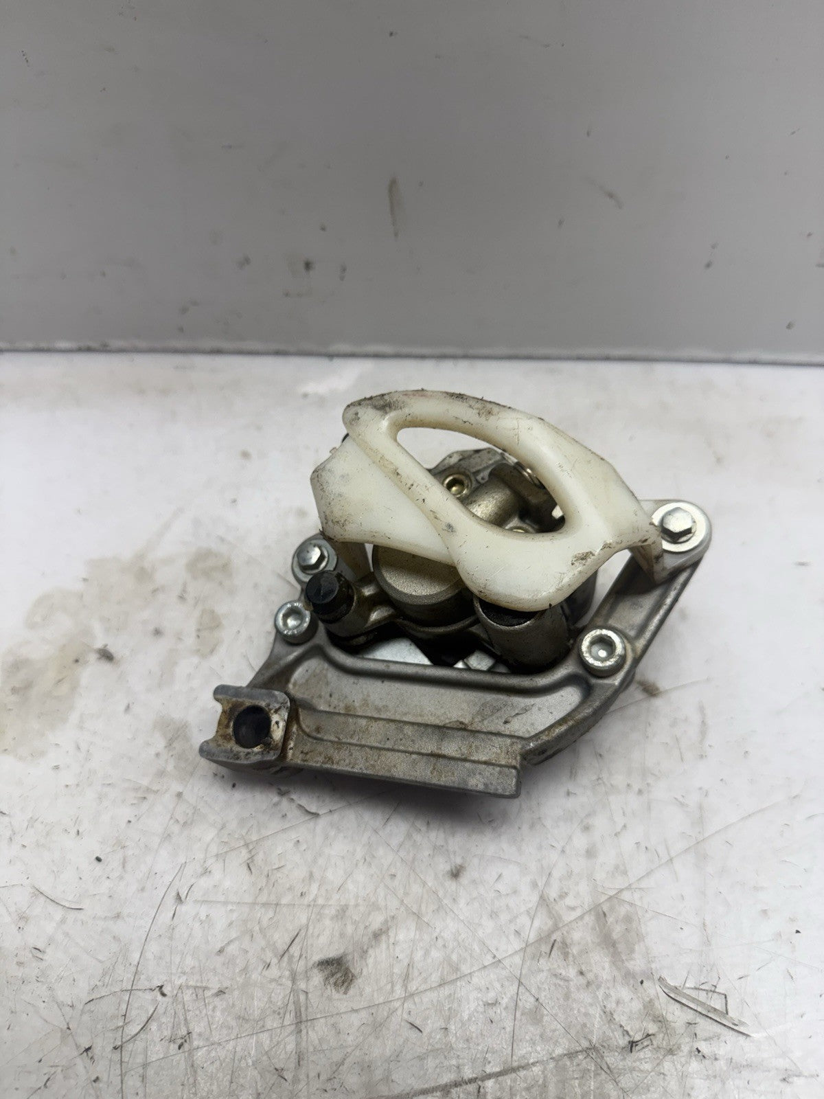 2004-2027 KAWASAKI KX65 OEM REAR HYDRAULIC BRAKE CALIPER ASS’Y